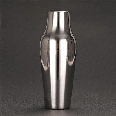 Stainless steel cocktail cobbler shaker on a dark background