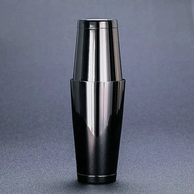 Black shaker on a gray background