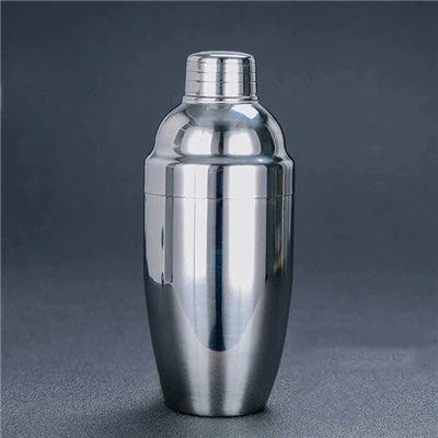Stainless steel cocktail cobbler shaker on a dark gray background