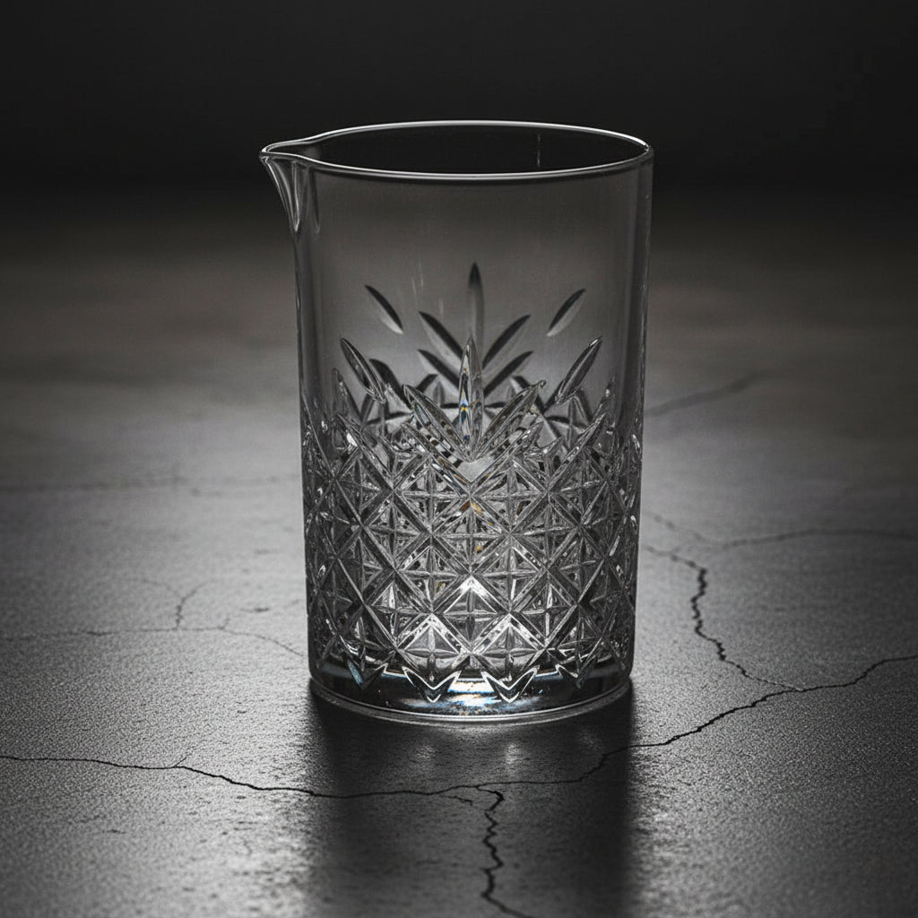 Crystal glass with geometric pattern on a dark surface