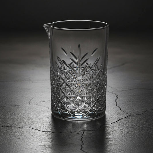 Crystal glass with geometric pattern on a dark surface